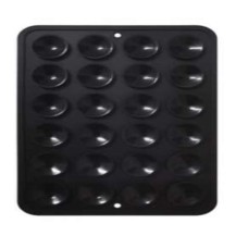 Stickpad MagSafe Noir fixé sur une surface lisse