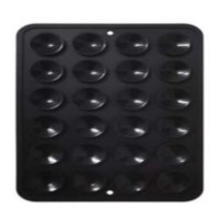 Stickpad MagSafe Noir fixé sur une surface lisse